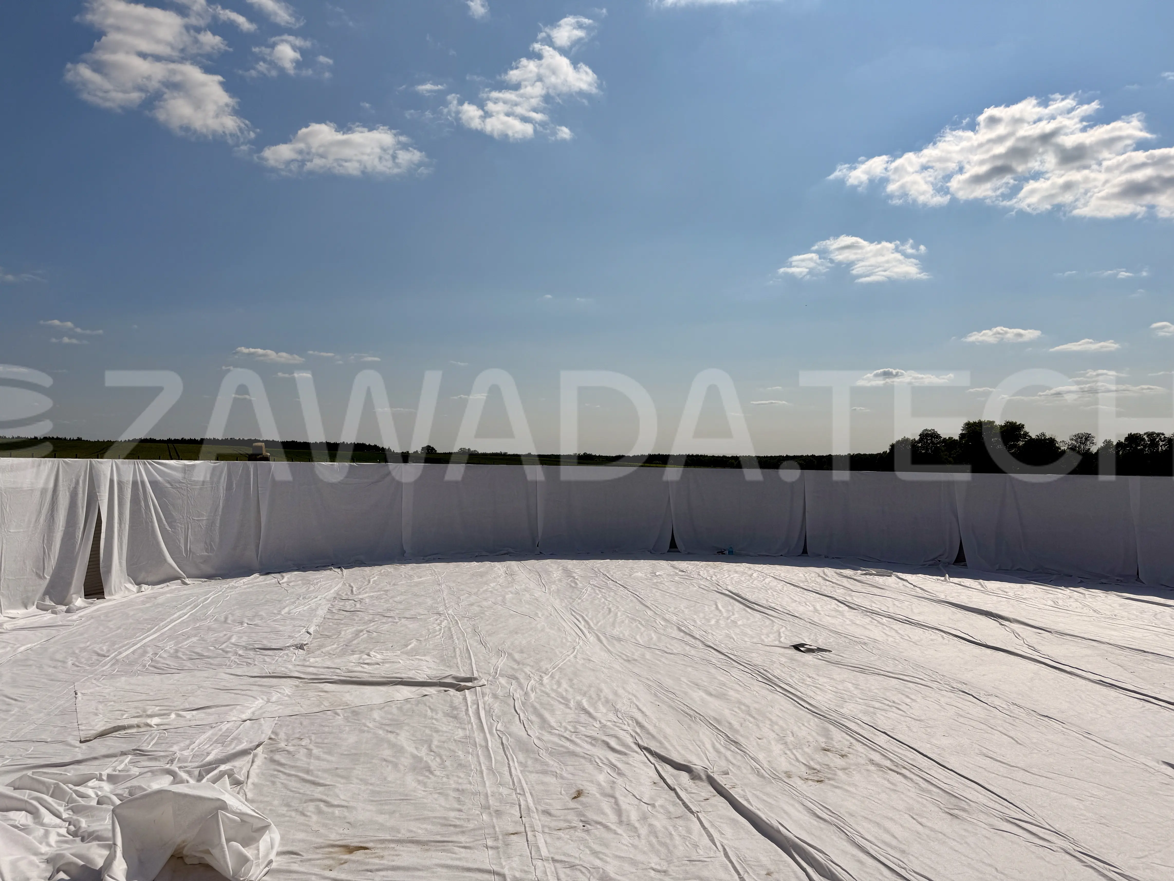 Zbiornik na gnojowicę - montaż filcu ochronnego na ścianie oraz dnie, przed montażem membrany